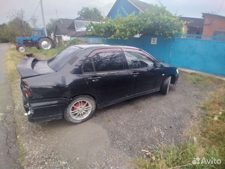 Mitsubishi Lancer 1.6 МТ, 2002, 27 000 км
