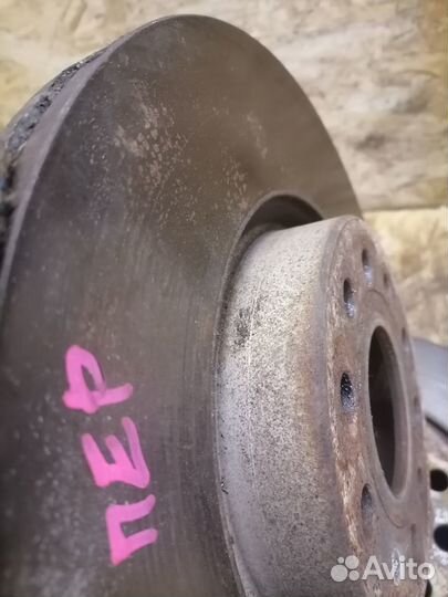 Диск тормозной передний Volkswagen Passat B6