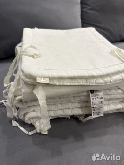 Бортики в кроватку stokke