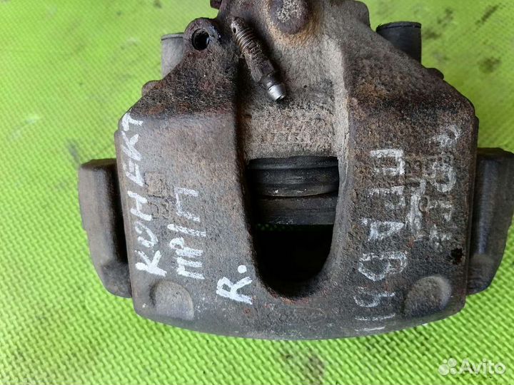 Суппорт передний правый Форд Торнео Коннект