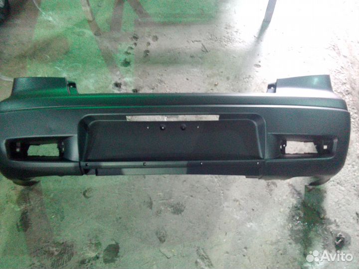 Бампер задний на митсубиси аутлендер 01-08 г.в