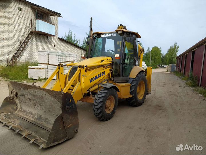Экскаватор-погрузчик Komatsu WB93R-5E0, 2013