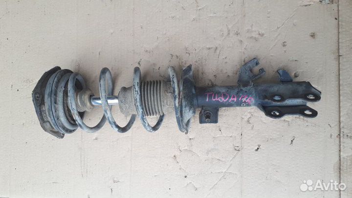 Амортизатор передний правый Nissan Tiida Latio