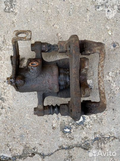 Суппорт задний левый Hyundai/Kia 583101RA30