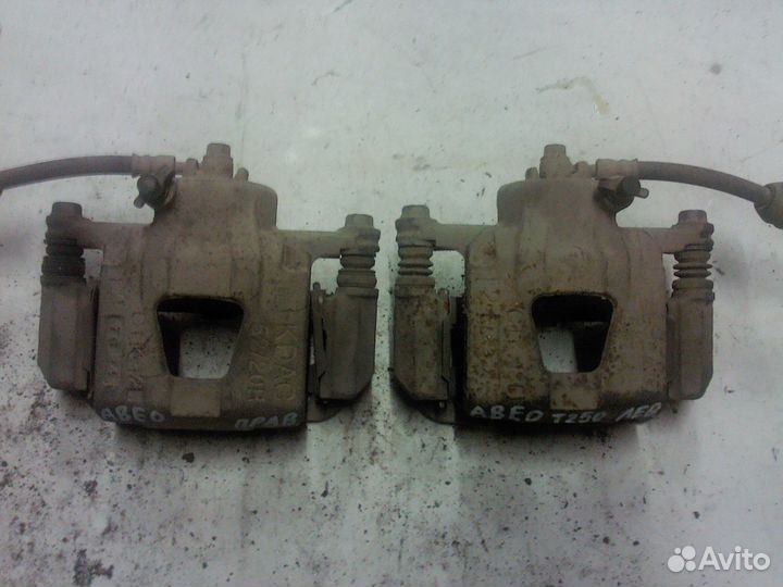 Суппорт передний Chevrolet Aveo T250