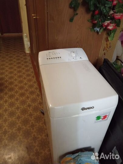 Стиральная машина с вертикальной загрузкой