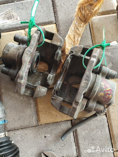 Суппорт передний Мазда demio