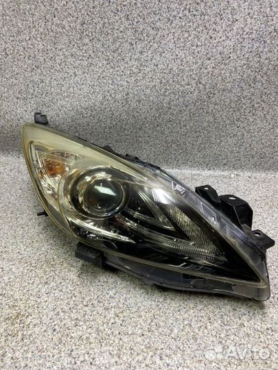 Фара Mazda 3 BL 2010