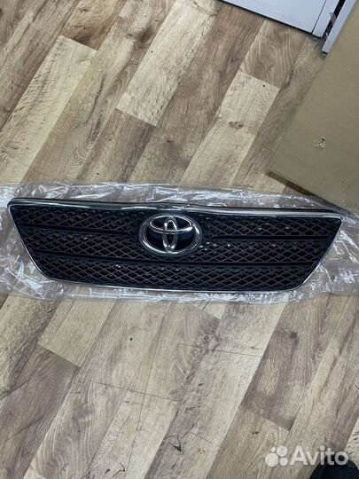 Решетка радиатора Toyota Corolla 120