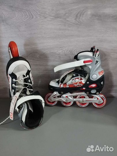 Роликовые коньки