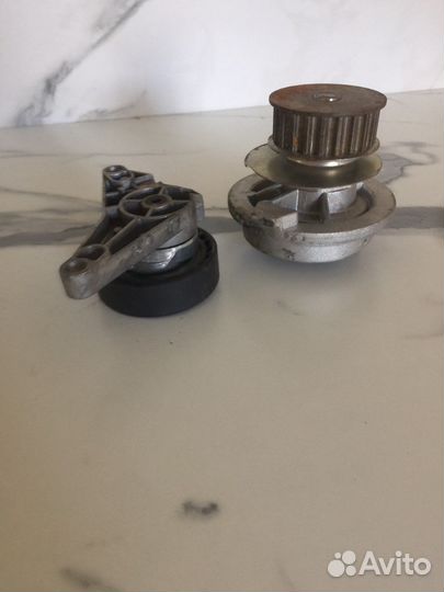 Помпа и ролик натяжителя daewoo espero