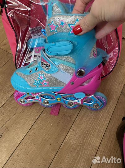 Роликовые коньки