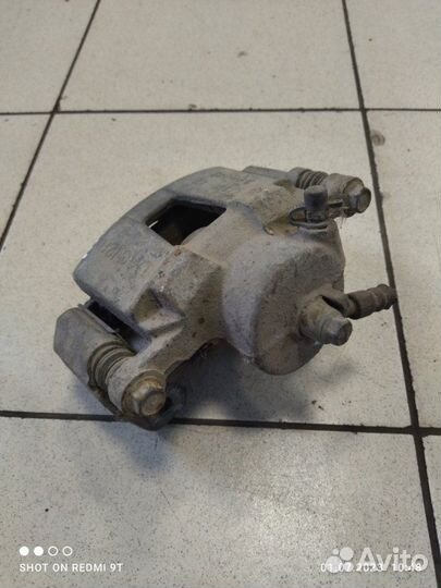 Суппорт тормозной передний правый Chevrolet