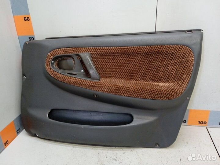 Обшивка двери передняя правая Daewoo Nexia N100