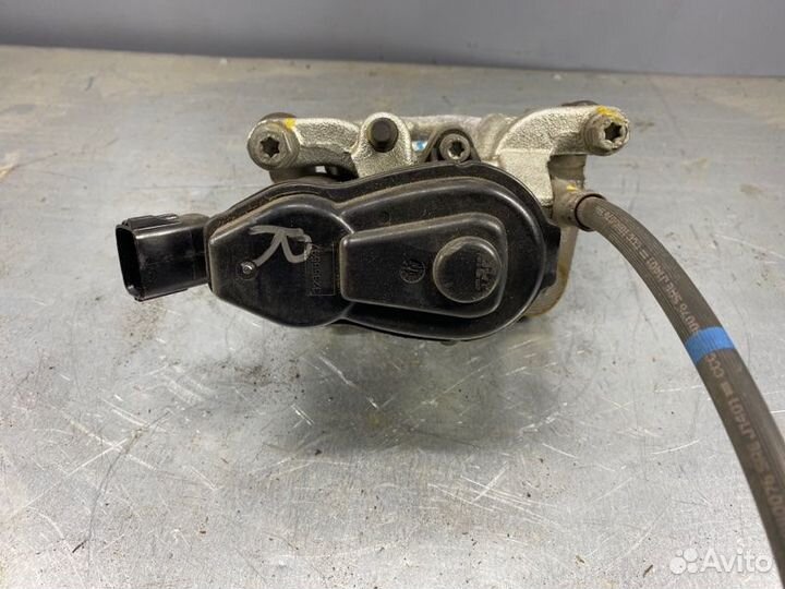 Суппорт тормозной задний левый/правый mazda 3 BM