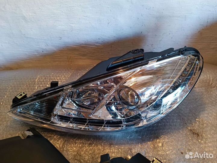 Фары Peugeot 206