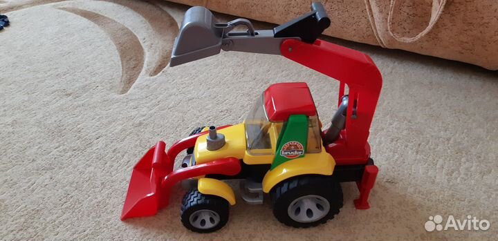 Экскаватор-погрузчик Bruder новый