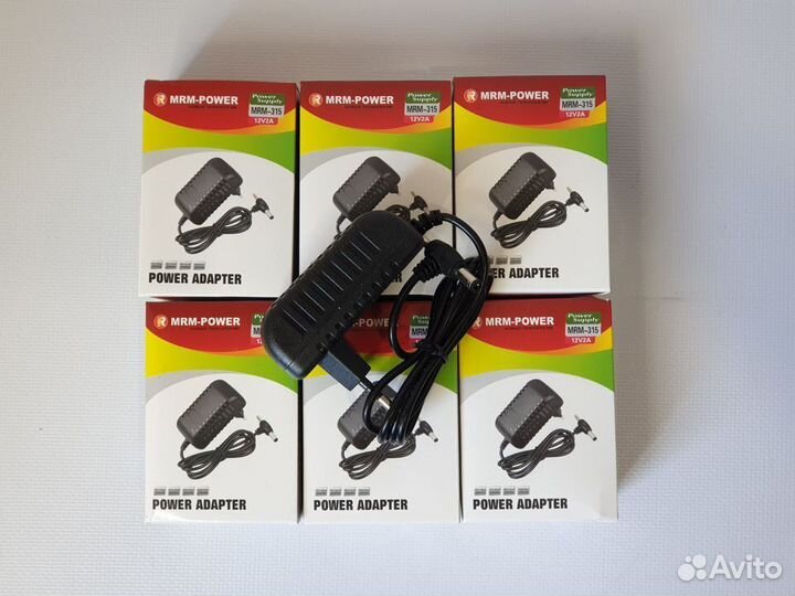 Блок питания сетевой адаптер универсальный 12V 2A