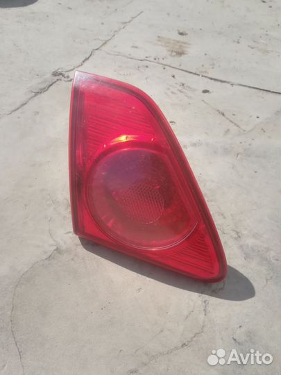 Фонарь внутренний левый Toyota Corolla E150