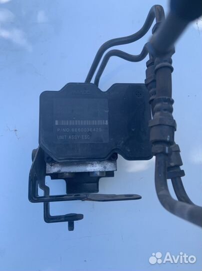 Блок ABS (насос) Киа Мохаве 2008-2016 год