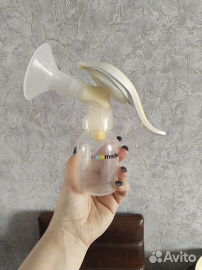 Молокоотсос medela