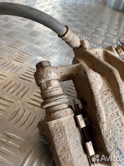 Суппорт тормозной задний правый Hyundai Elantra HD