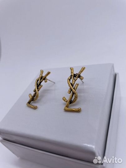 Стильные серьги золото