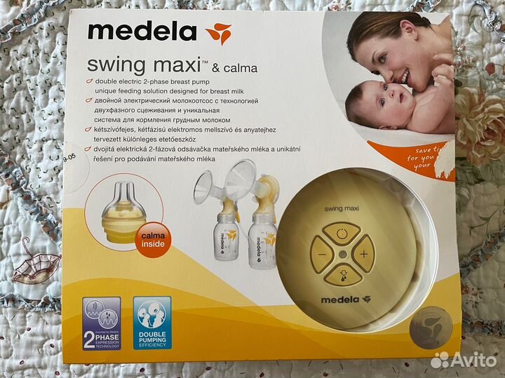 Молокоотсос электрический двойной medela