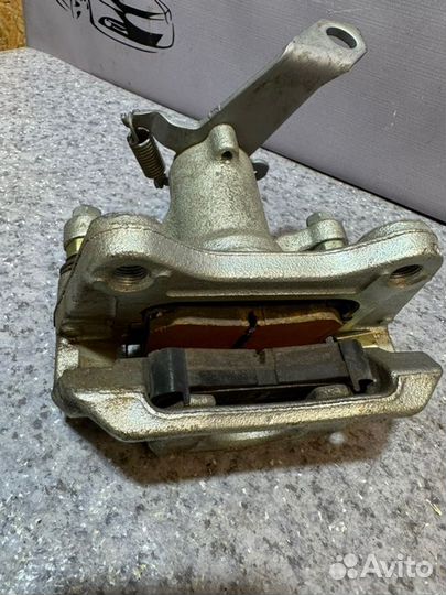 Суппорт задний левый Kia Seltos SP2 1.6 G4FG МКПП