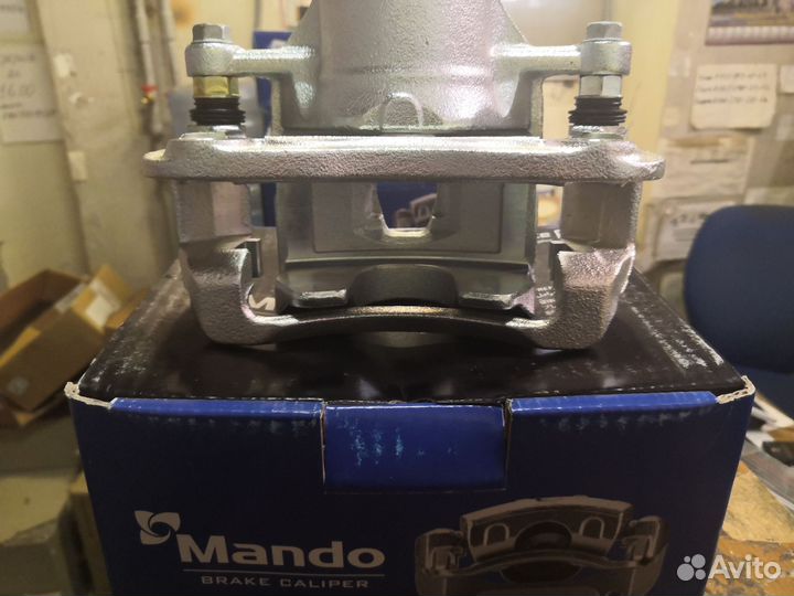 Суппорт тормозной передний левый EX581801RA00