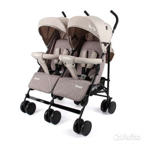 Коляска для двойни погодок