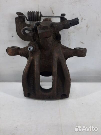 Суппорт тормозной задний левый Jaguar X-Type седан