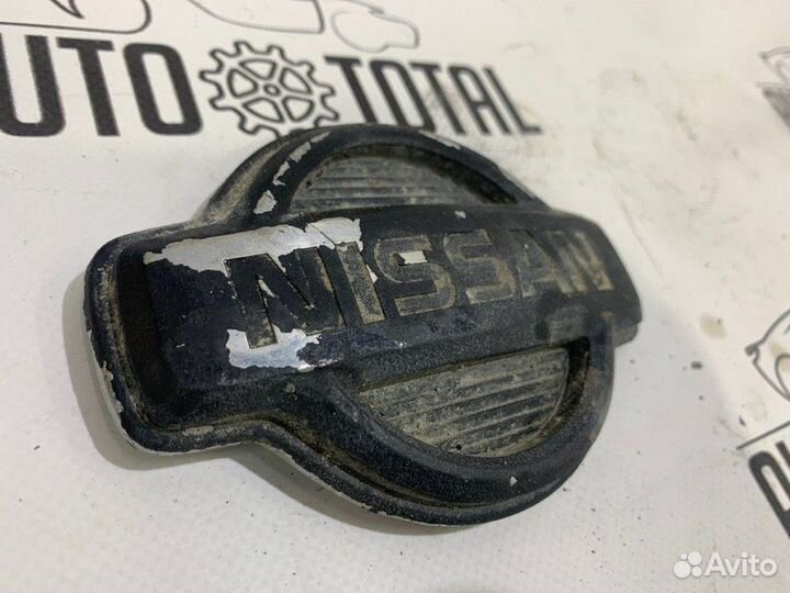 Эмблема передняя Nissan X-Trail T30 QR20DE 2004