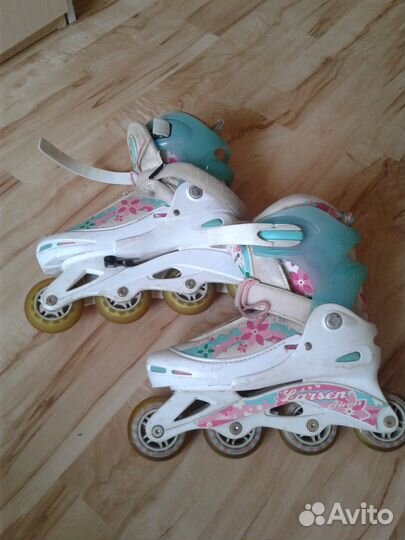 Роликовые коньки