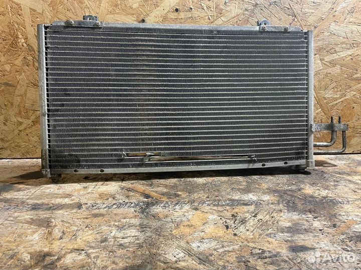 Радиатор кондиционера Киа Спектра