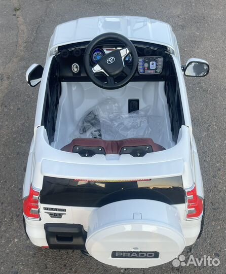 Детский электромобиль LC200 новый