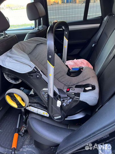 Коляска автокресло doona с базой isofix