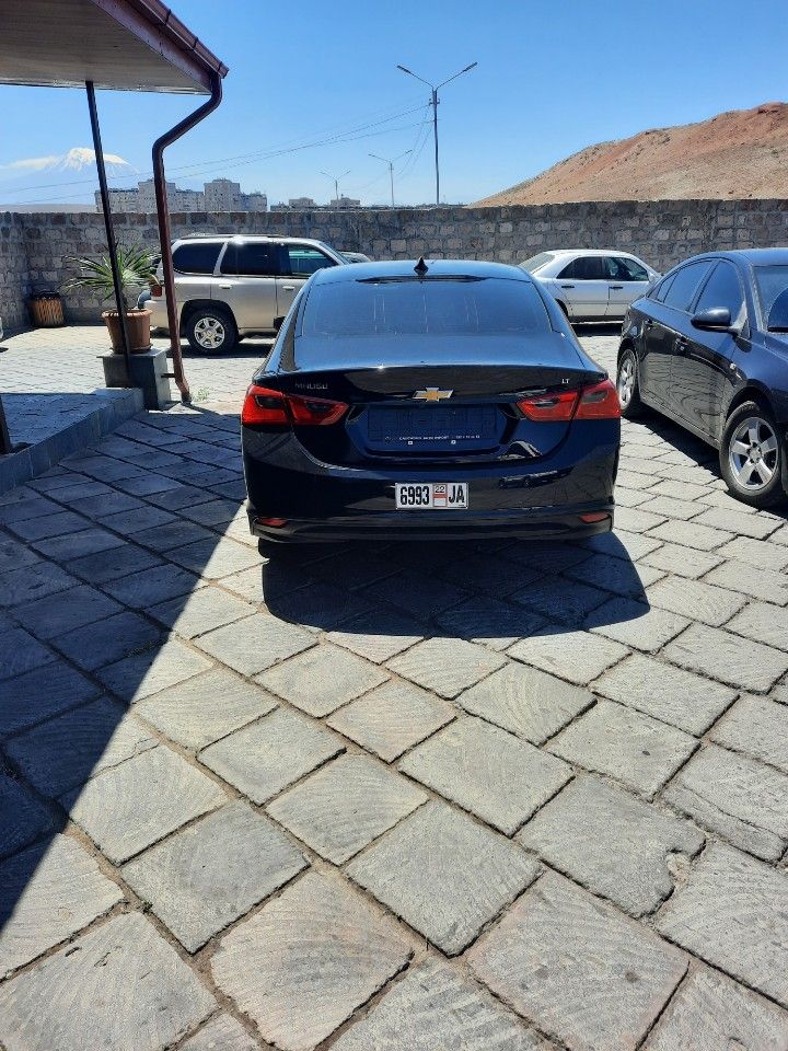 Chevrolet Malibu: фото владельца