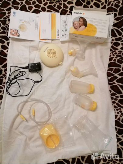 Молокоотсос medela электрический