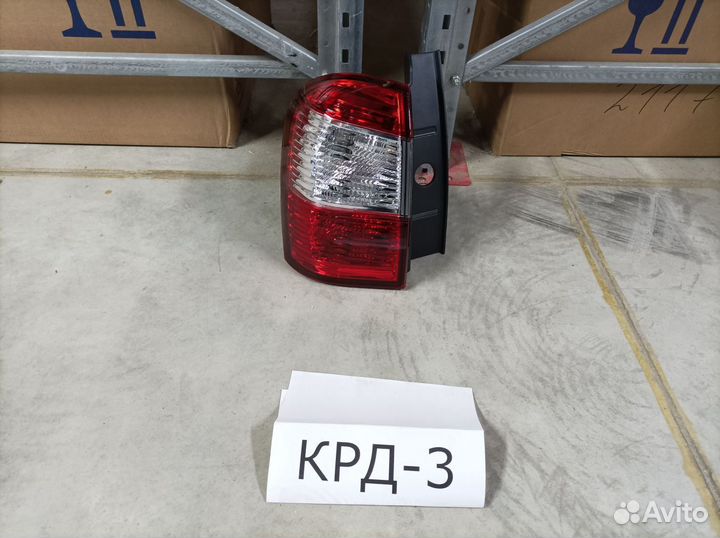 Фонарь левый внешний Nissan Terrano 2014