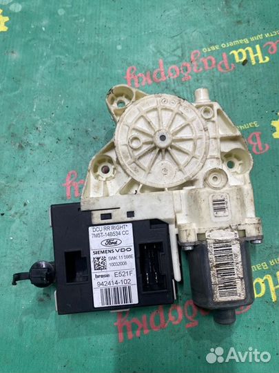 Моторчик стеклоподъемника задний правый Ford Focus