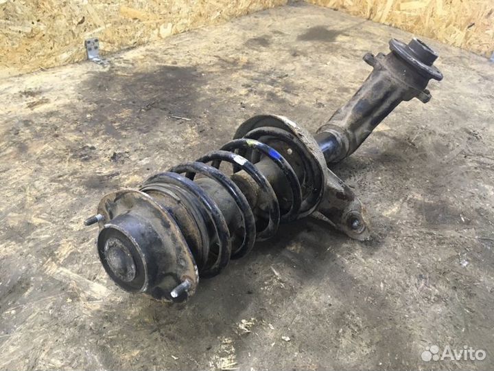 Стойка подвески передняя правая Daewoo Nexia седан