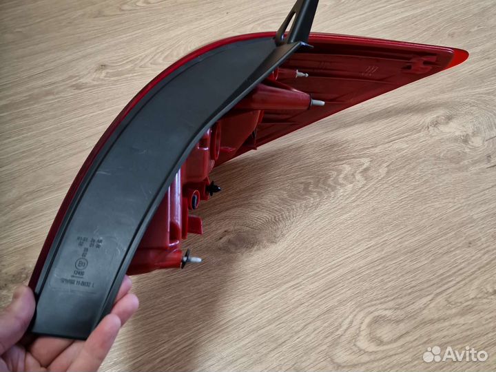 Фонарь задний левый Nissan Tiida (depo 21519k8lae)