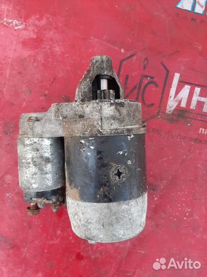 Стартер Мазда 323 1,5л 1999г