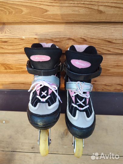 Роликовые коньки