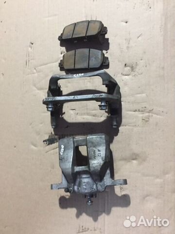 Суппорт тормозной передний левый Honda Accord 10