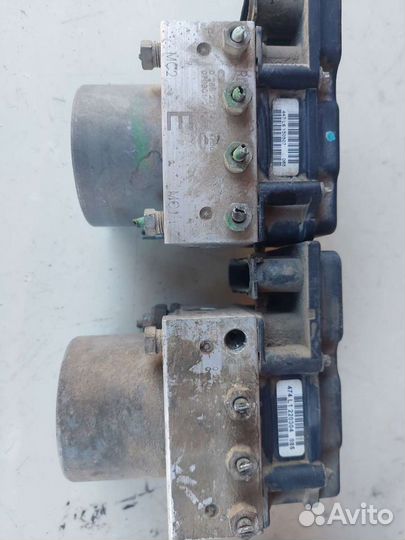 Блок ABS Nissan almera N16, Note Е11,Passat B5