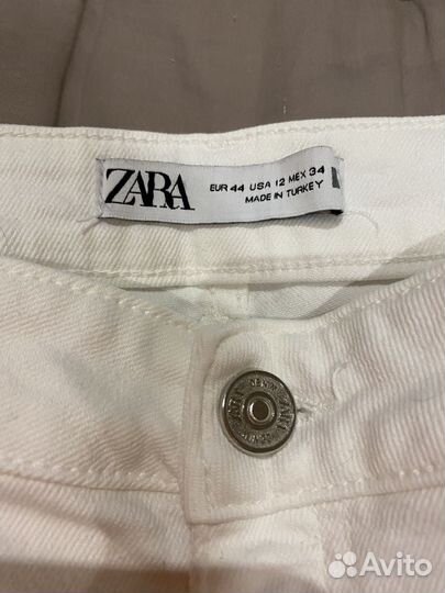 Джинсы zara с разрезами 34
