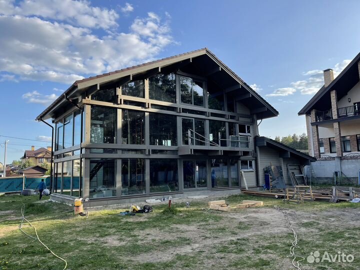 Панорамное безрамное остекление фахверк