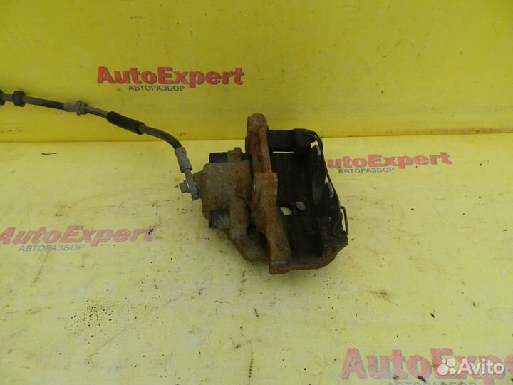 Суппорт передний правый Skoda Rapid